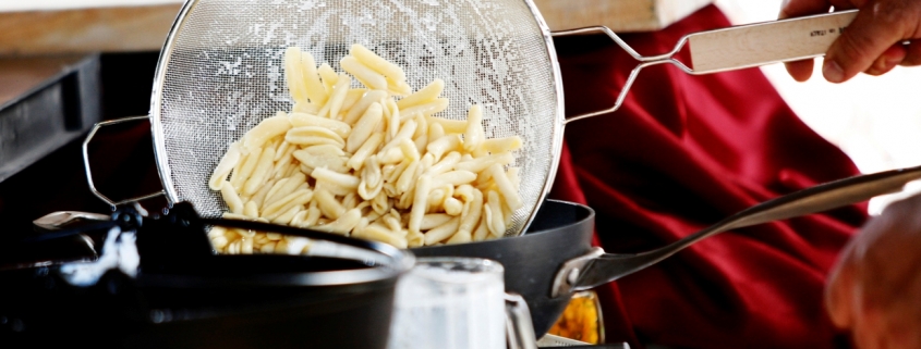 Pasta going into water